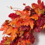 Alternate angle of the Autumn Blaze Red Maple Door Mantel Wreath showing wreath face texture