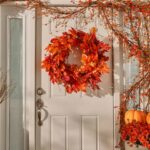 Close-up of blooms and berries on this Autumn Blaze Red Maple Door Mantel Wreath