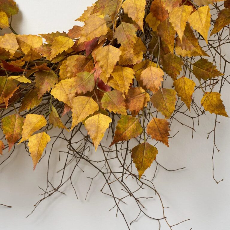 Close-up of blooms and berries on this Golden Yellow and Brown Birch Front Door Wreath