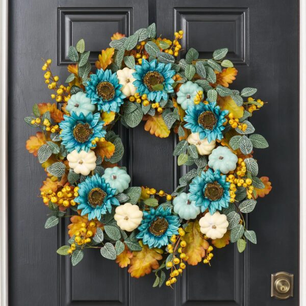 Close-up of blooms and berries on this Pumpkins by the Sea Front Door Wreath