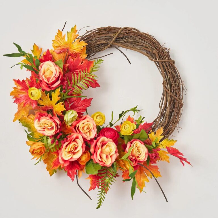 Close-up of blooms and berries on this Maple Medley - Flame Rose Door Side Wreath
