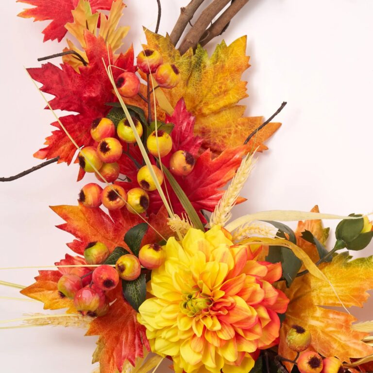 Close-up of blooms and berries on this Vision of Autumn - Mixed Front Door Wreath