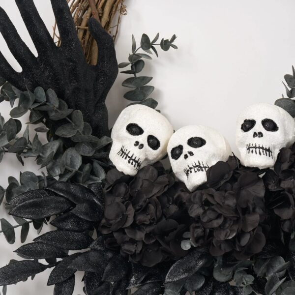 Close-up of blooms and berries on this Haunting Beauty - Midnight Eucalyptus, Halloween Fall Wreath