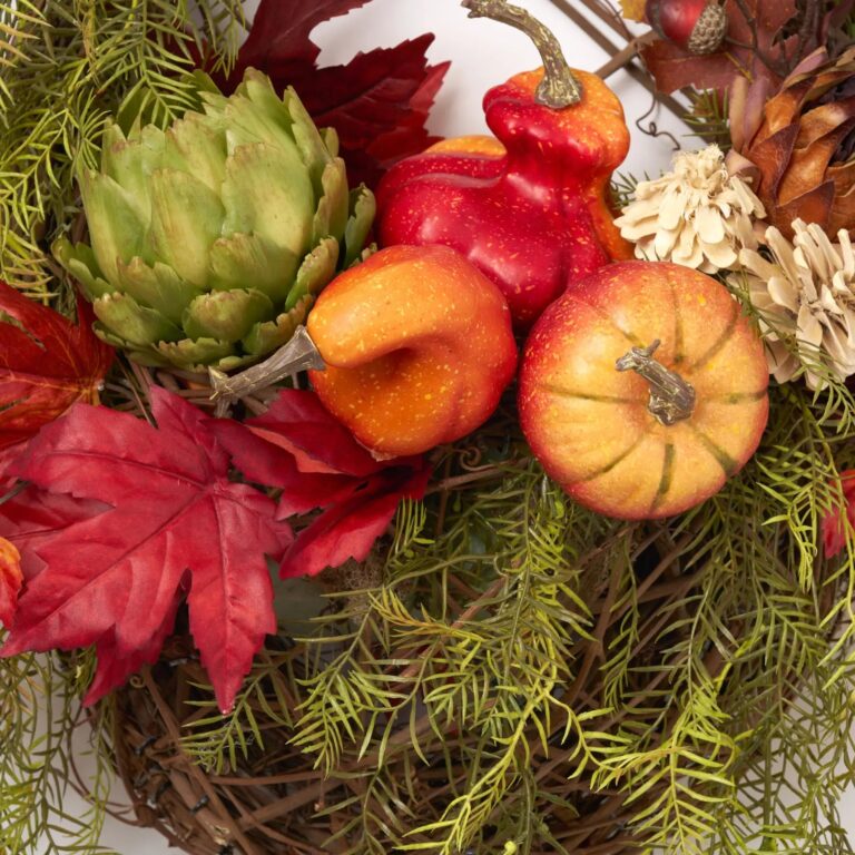 Close-up of blooms and berries on this Heirloom Harvest - Green Artichoke, Door Basket Wreath