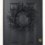 Alternate angle of the Black Glitter Twig Branch Halloween Front Door Wreath showing wreath face