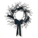 The Creatures of the Night Fall Halloween Wreath shown in full, highlighting full wreath shape
