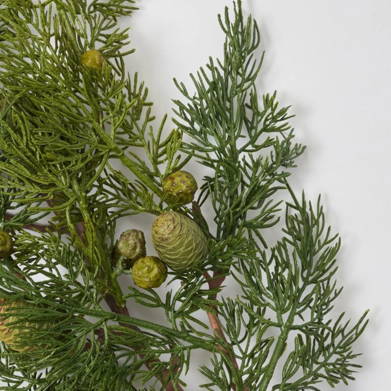 Close-up of bloom tips on this Real Touch Green Cedar and Pinecone Christmas Faux