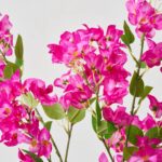 Close-up of leaf foliage texture on this Short Faux Magenta Bougainvillea Potted Tree Outdoor Urn