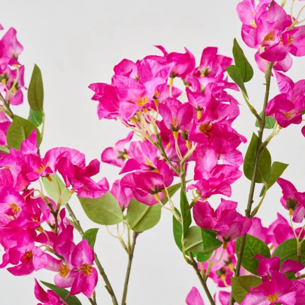 Close-up of leaf foliage texture on this Tall Faux Magenta Bougainvillea Potted Tree Outdoor Urn