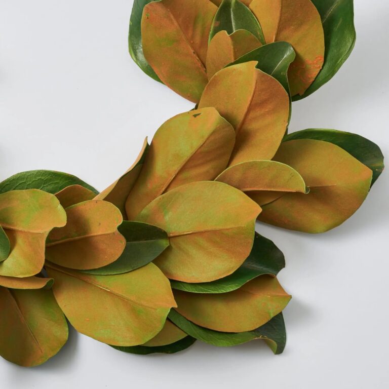 Close-up of greenery along the garland on this Real Touch Magnolia Leaf All Front Door