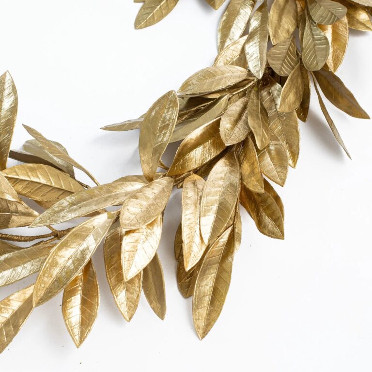 Close-up of greenery along the garland on this Antiqued Gold Bay Leaf Christmas Front Door