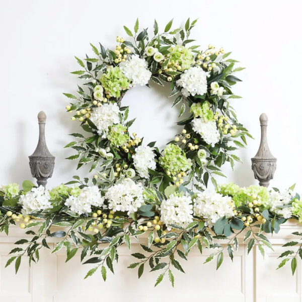 Close-up of greenery along the garland on this White and Green Hydrangea Greenery Mantle Garland