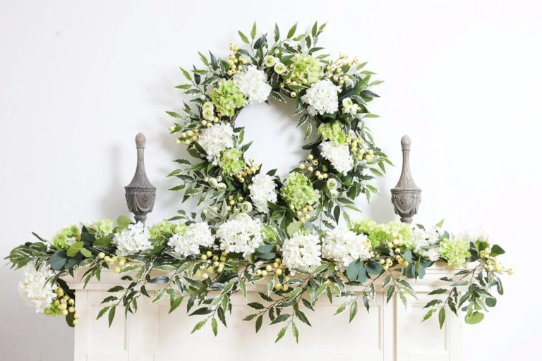 Close-up of greenery along the garland on this White and Green Hydrangea Greenery Mantle Garland