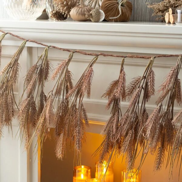 Close-up of greenery along the garland on this Amber Waves of Grain Autumn Mantel Garland