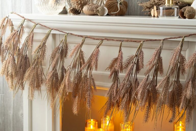 Close-up of greenery along the garland on this Amber Waves of Grain Autumn Mantel Garland