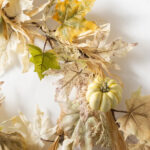 Close-up of greenery along the garland on this Neutral Autumn Leaf, Pumpkin Harvest Mantle Garland