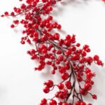 Close-up of greenery along the garland on this Waterproof Red Berry Christmas Holiday Holiday Mantle