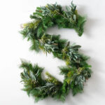 Close-up of greenery along the garland on this Seeded Eucalyptus and Christmas Pine Holiday Mantle