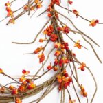 Close-up of greenery along the garland on this Wild Bittersweet Berry and Twig Mantle Fall