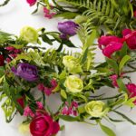 Alternate angle of the Mixed Magenta, Purple and Green Runner Mantle Garland showing full length