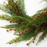 Close-up of greenery along the garland on this Wild Cranberry and Cedar Greenery Runner Mantle
