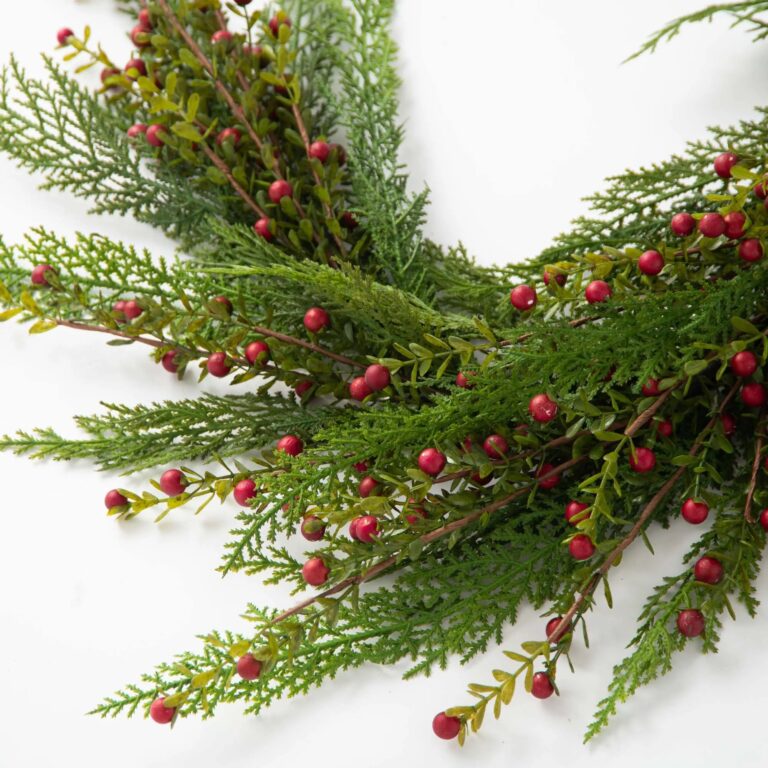 Close-up of greenery along the garland on this Wild Cranberry and Cedar Greenery Runner Mantle