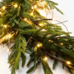 Alternate angle of the Twig Light and Real Touch Christmas Mantle Garland showing full length