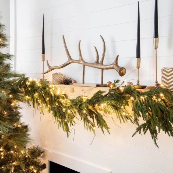 Close-up of greenery along the garland on this Twig Light and Real Touch Christmas Mantle