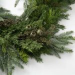 Close-up of greenery along the garland on this Winter's Bounty - Mixed Juniper, Christmas Mantle