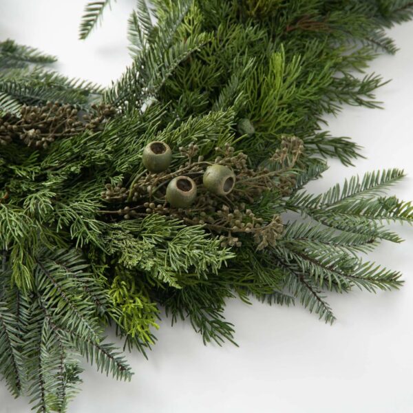 Close-up of greenery along the garland on this Winter's Bounty - Mixed Juniper, Christmas Mantle
