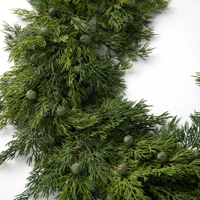 Close-up of greenery along the garland on this Green Real Touch Seeding Juniper Greenery Mantel