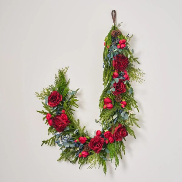 Close-up of greenery along the garland on this Red Queen Rose, Mixed Winter Christmas Mantle