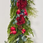 Detail view of berry and foliage detail from the Red Queen Rose, Mixed Winter Christmas