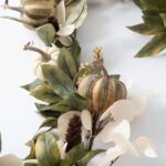 Close-up of greenery along the garland on this Dried - Look Bleached Lunaria Fall Mantel