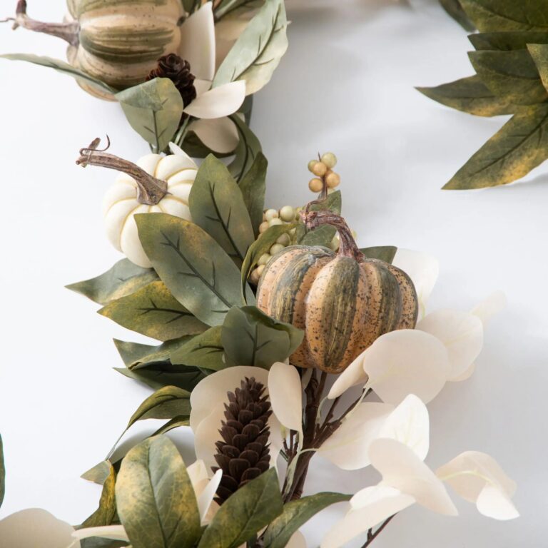 Close-up of greenery along the garland on this Dried - Look Bleached Lunaria Fall Mantel