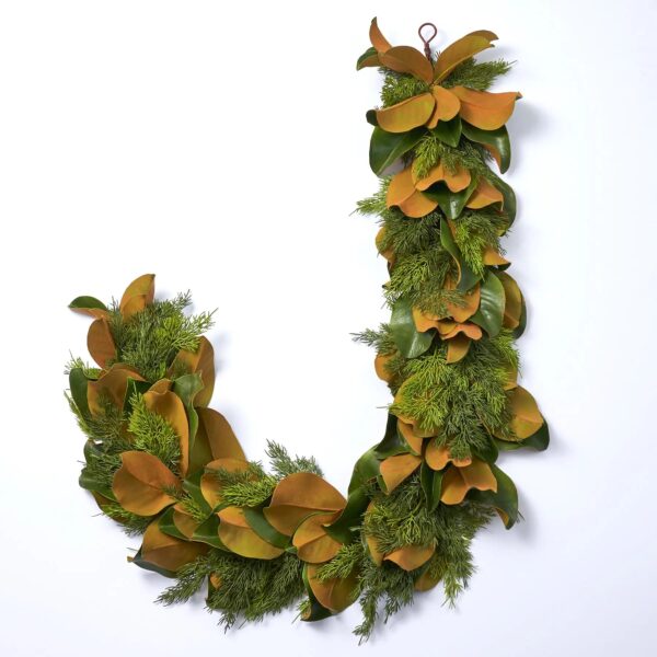 Close-up of greenery along the garland on this Real Touch Magnolia Leaf Winter Greenery Garland