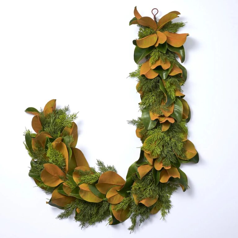 Close-up of greenery along the garland on this Real Touch Magnolia Leaf Winter Greenery Garland
