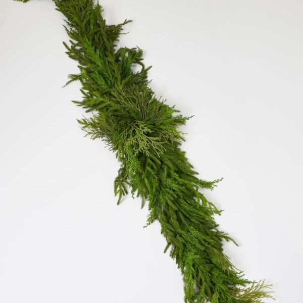 Close-up of swag tail detail on this Real Touch Winter Greenery Large Runner Swag