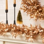 Alternate angle of the Shiny Metallic Gold Boxwood Christmas Mantle Garland Festive showing full length