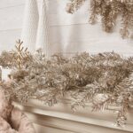 Detail view of berry and foliage detail from the Silver and Gold Metallic Soft Tinsel