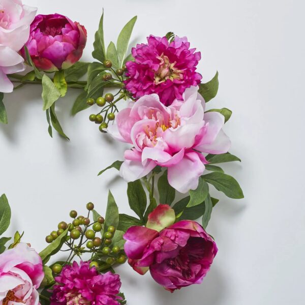 Close-up of greenery along the garland on this Pink Peony and Beauty Ranunculus Floral Mantel