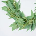 Close-up of greenery along the garland on this All Seasons Faux Blade Eucalyptus Eucalyptus Mantel