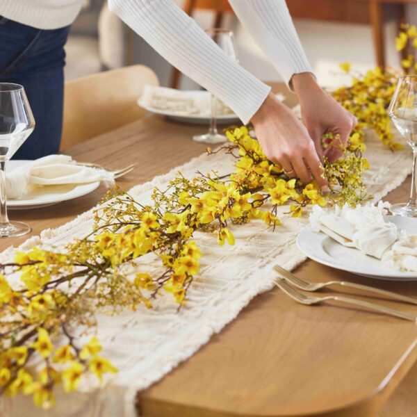 Close-up of greenery along the garland on this Flowering Yellow Forsythia Blossom Spring Mantel Garland