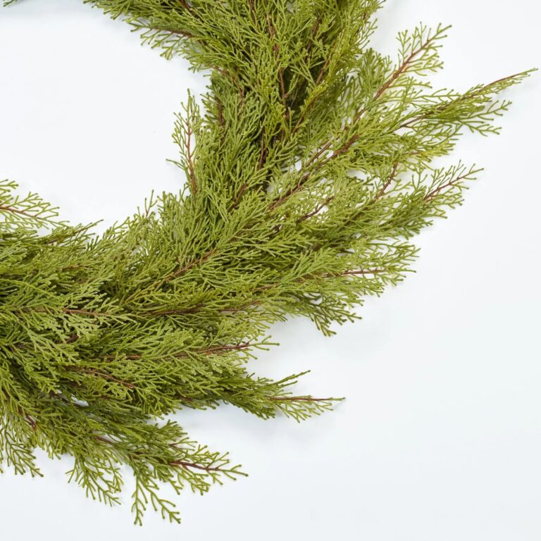 Close-up of greenery along the garland on this Real Touch Cedar Christmas Holiday Front Door