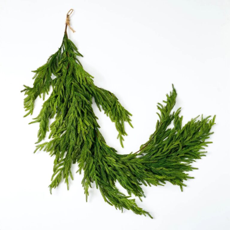 Close-up of greenery along the garland on this Draping Real Touch Norfolk Pine Norfolk Pine