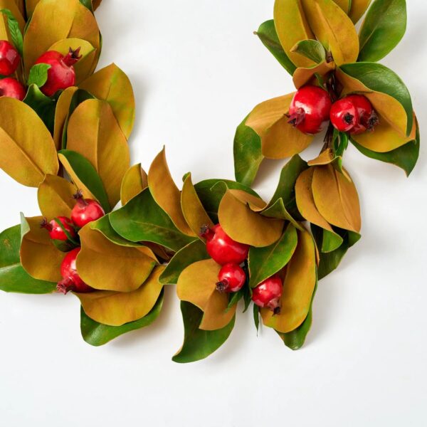 Close-up of greenery along the garland on this Real Touch Magnolia Leaf Front Door Garland
