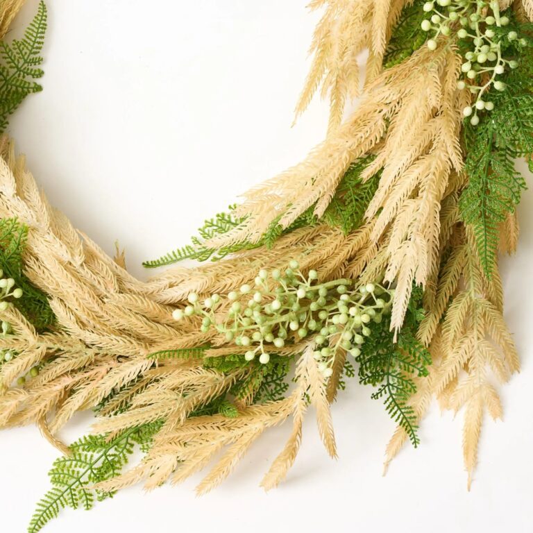 Close-up of greenery along the garland on this Fern Queen - Green Lace Spring Summer
