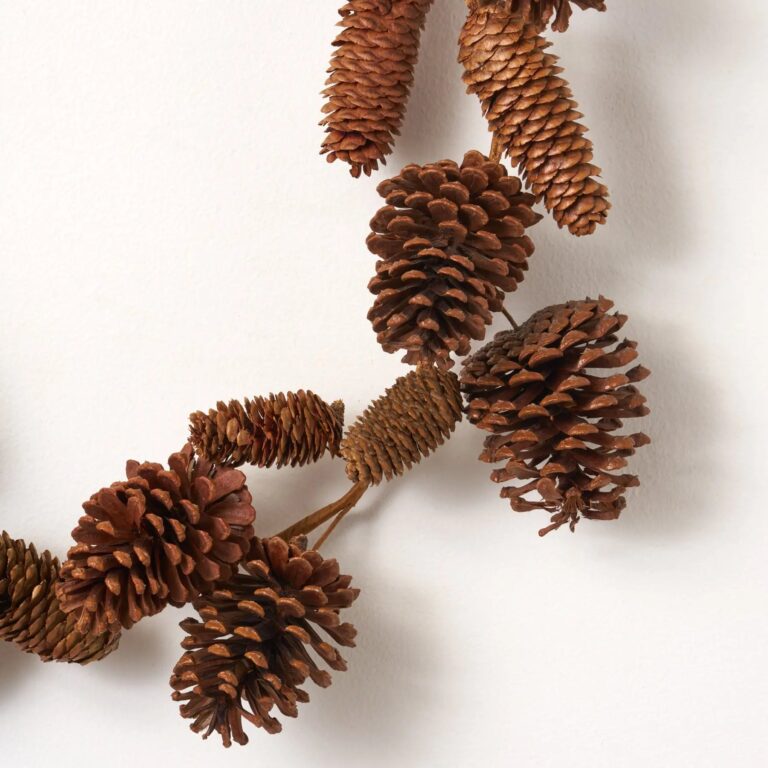 Close-up of greenery along the garland on this Brown Mixed Wired Natural Dried Christmas Mantle