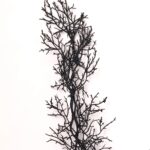 Close-up of greenery along the garland on this Black Glitter Twig Branch Halloween Fall Mantle