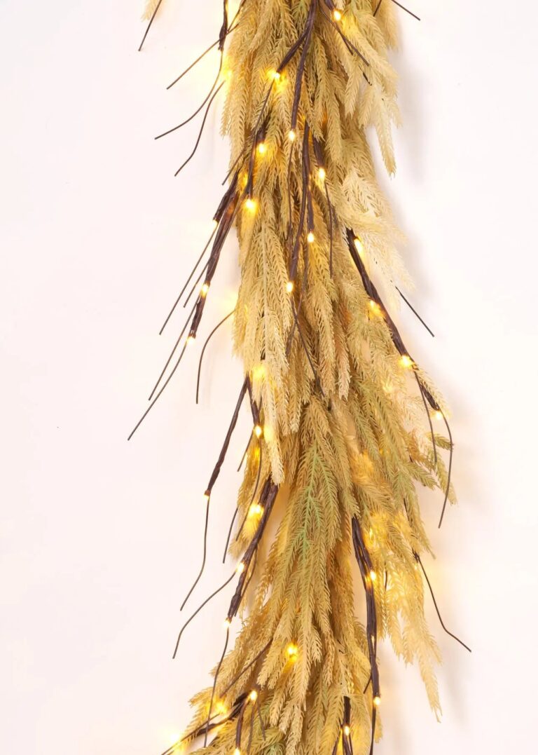 Close-up of greenery along the garland on this Pre - Lit Dried Christmas Mantle Garland